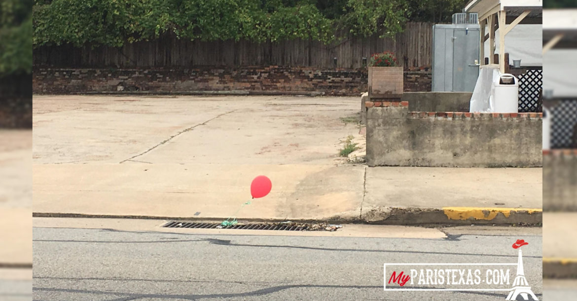 Red 'IT' balloons spotted on storm drains Scaring residents around